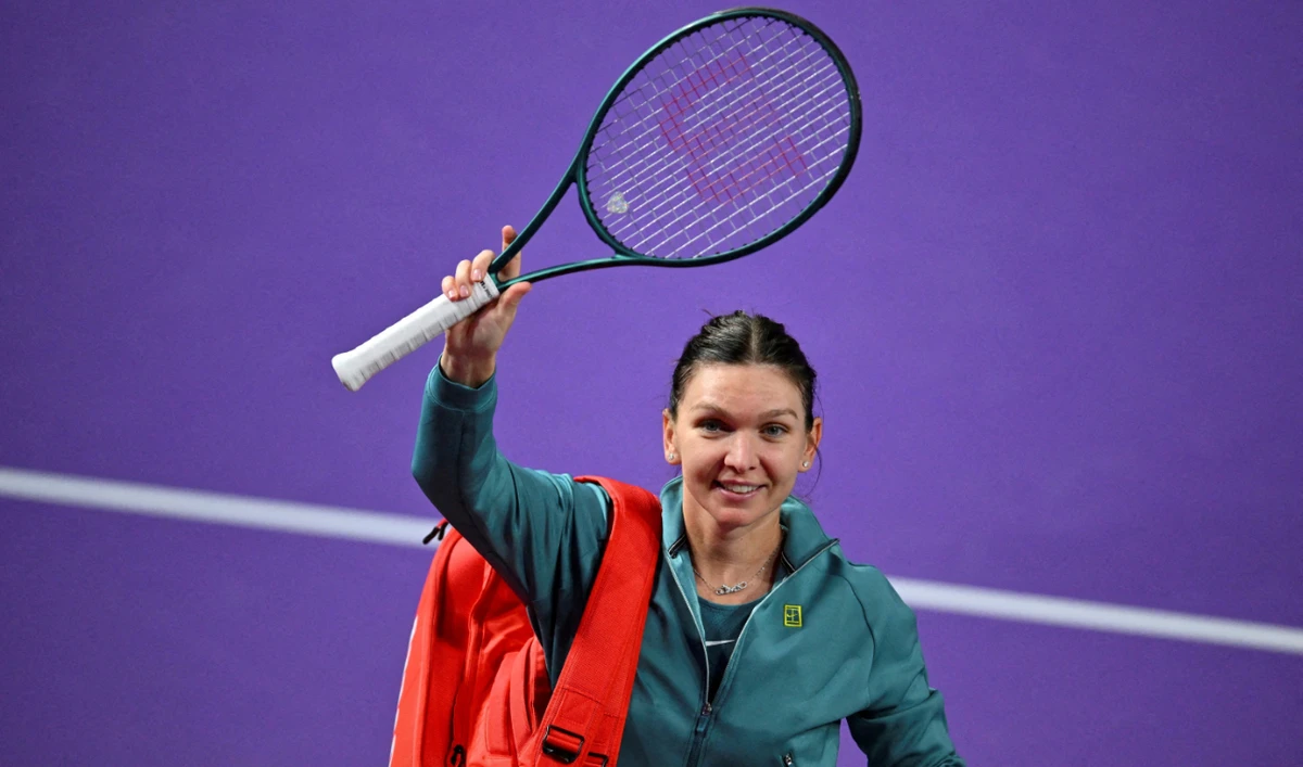Simona Halep waves to the crowd at the end of a match during the Transylvania Open in Cluj-Napoca, Romania, on Feb. 4, 2025. (Reuters)