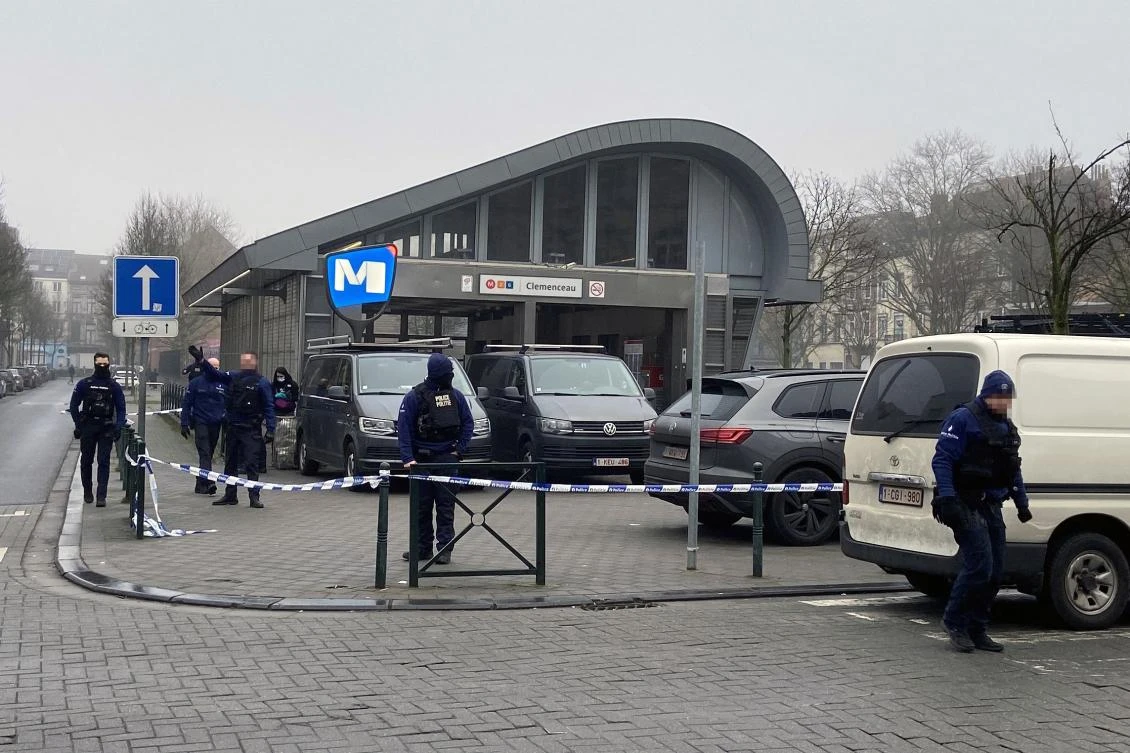 Police officers stand guard outside the Clemenceau metro station following a shooting, in Brussels on Feb. 5, 2025. (AFP)
