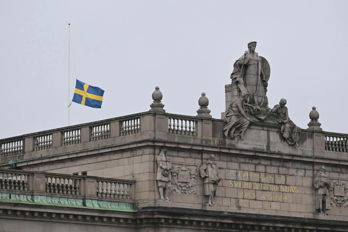 A Swedish flag flies at half-mast at the Swedish Parliament in Stockholm, Wednesday Feb. 5, 2025, after a shooting at an adult education center on Tuesday. ( AP)