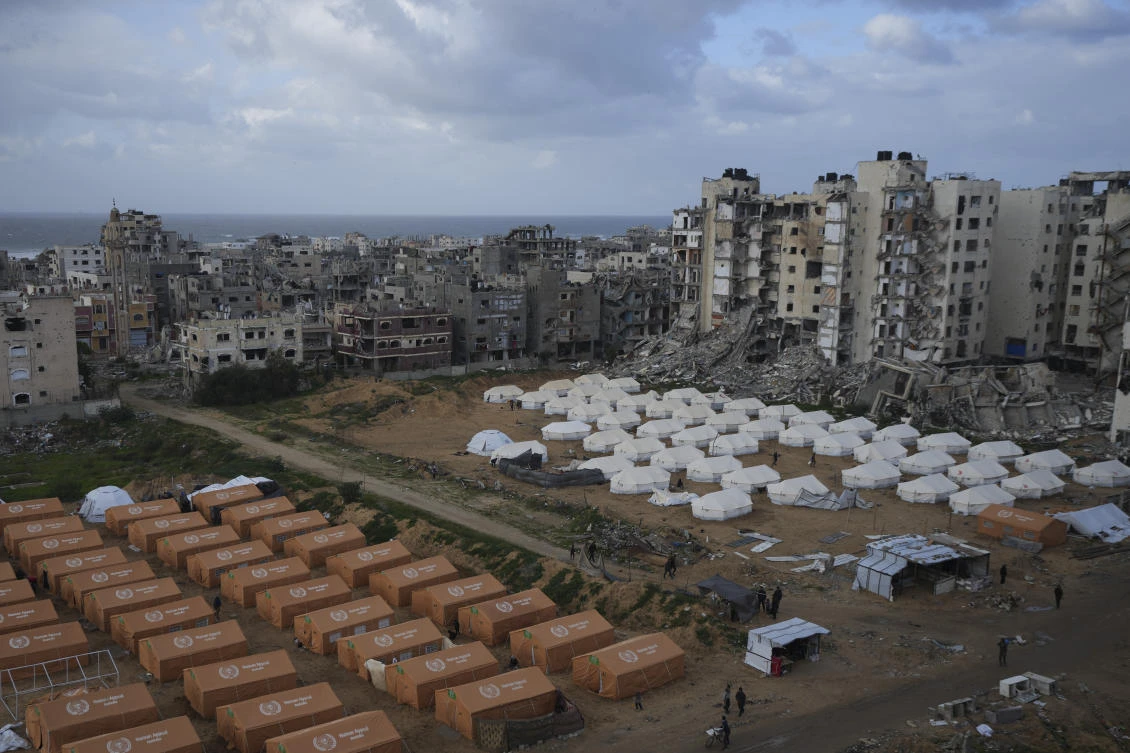A tent camp for displaced Palestinians is set up next to destroyed buildings following the Israeli air and ground offensive in Jabaliya, Gaza Strip, Feb. 6, 2025. (AP)