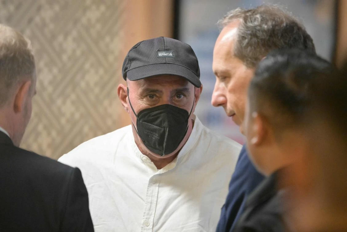 Serge Atlaoui (C), a Frenchman on death row in Indonesia since 2007 for drug offenses, looks on with French Ambassador to Indonesia Fabien Penone (R) at Jakarta’s Soekarno-Hatta International Airport in Tangerang, after leaving Salemba prison ahead of his repatriation to France on February 4, 2025. (AFP)