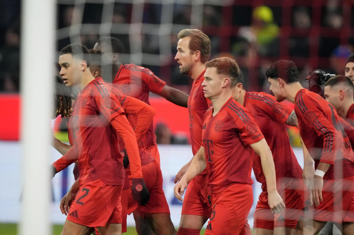 Players celebrate after Bayern Munich’s Harry Kane, scored the first goal of the match on a penalty shot during their Bundesliga match against Werder Bremen at the Allianz Arena in Munich, Feb. 7, 2025. (AP)