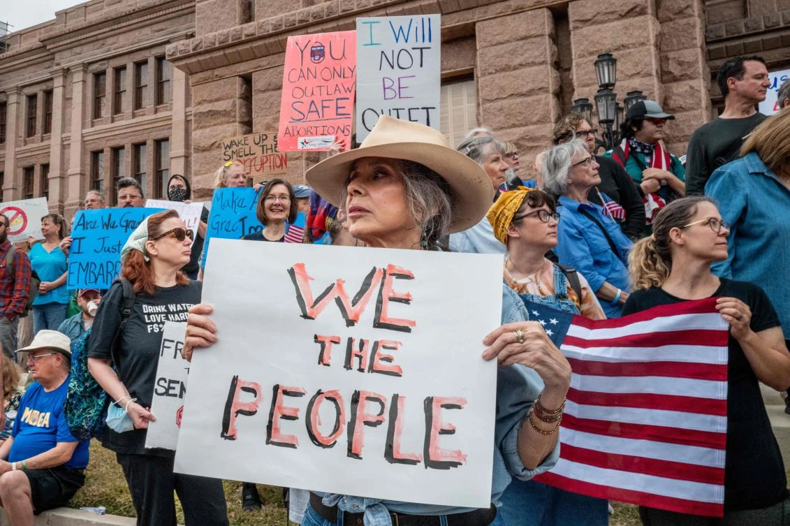 People gather in protest against US President Donald Trump during a demonstration. (Getty Images via AFP)