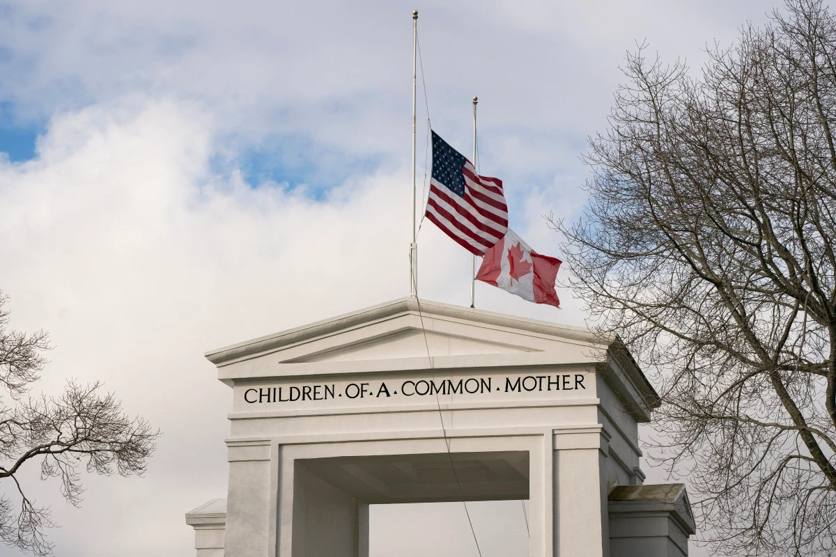 Flags fly above the Peace Arch monument on the border between the United States and Canada at Peace Arch Park on February 1, 2025 in Blaine, Washington. President Trump wants Canada to become the 51st US state. (Getty Images via AFP)