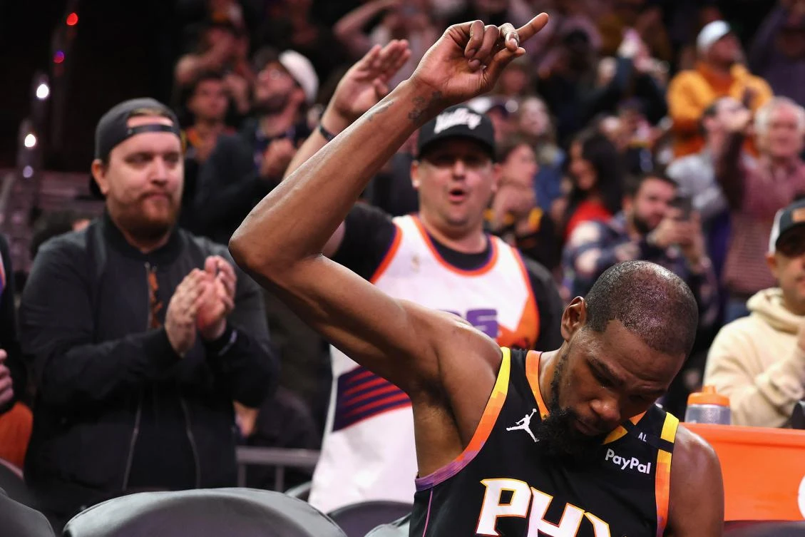 Kevin Durant of the Phoenix Suns acknowledges the fans after scoring his 30,000th career point during the second half of the NBA game against the Memphis Grizzlies at Footprint Center on Feb. 11, 2025 in Phoenix, Arizona. (Getty Images via AFP)