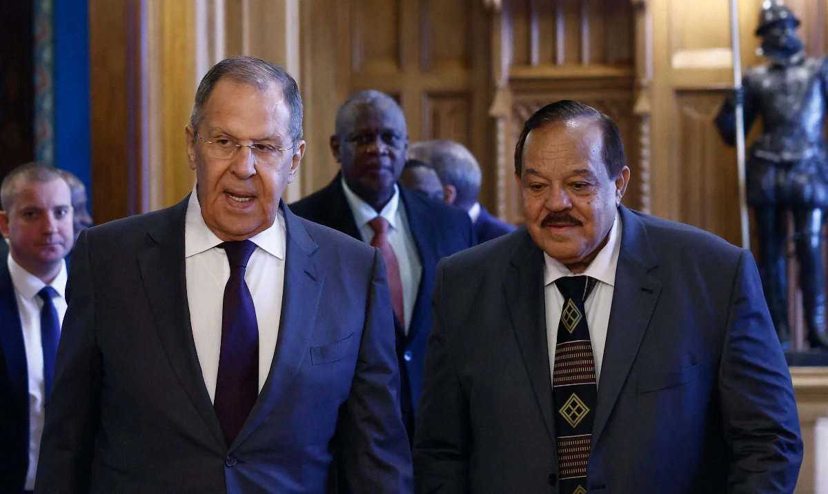 Russian Foreign Minister Sergei Lavrov (L) and his Sudanese counterpart Ali Yousuf Al-Sharif enter a hall during a meeting in Moscow, on February 12, 2025. (AFP)