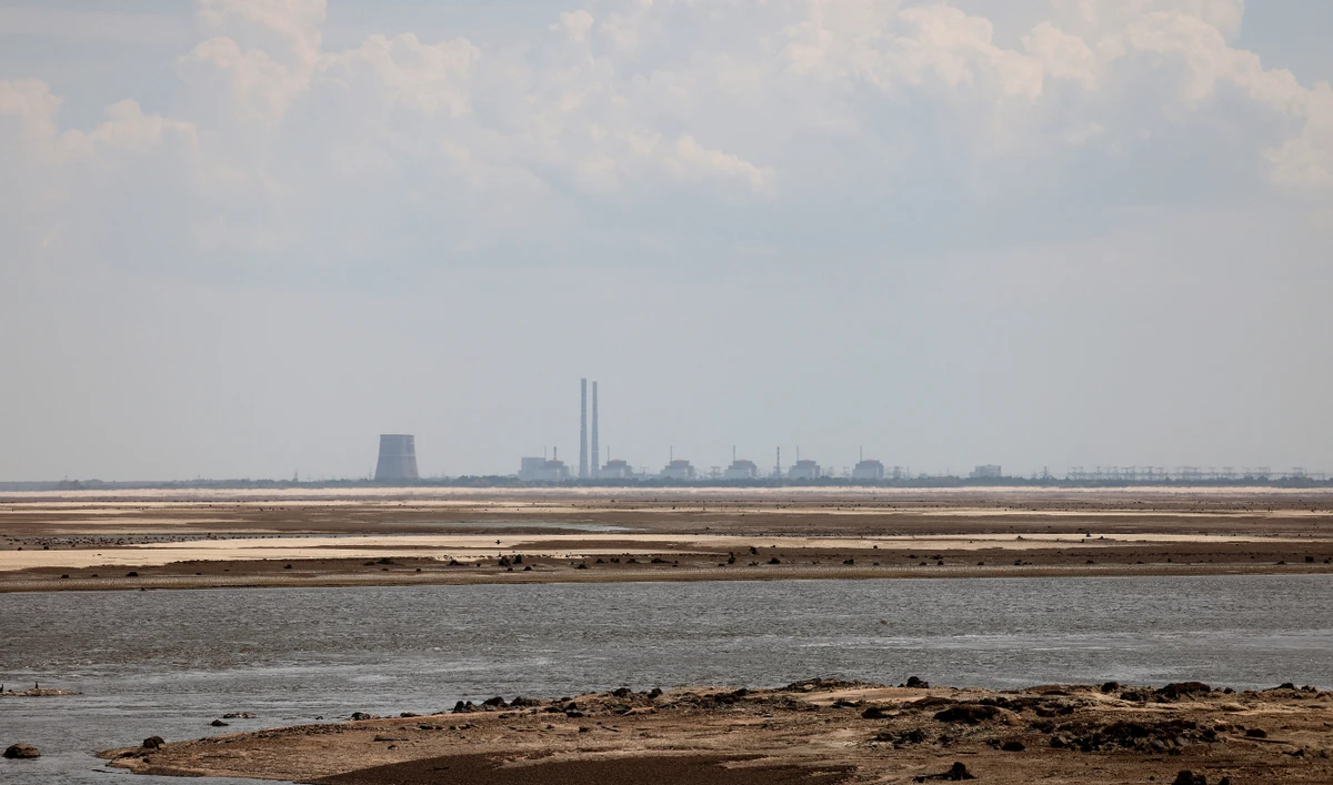 This photograph taken from Ukrainian city of Nikopol on July 7, 2023, shows the Zaporizhzhia nuclear power plant. (AFP/File)