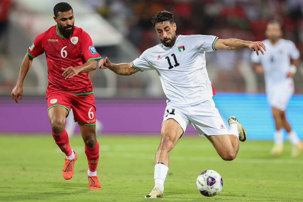Palestine international Oday Dabbagh’s, right, loan to Aberdeen comes with an option to buy in the region of $1m that can be triggered at the end of the season. (AFP)