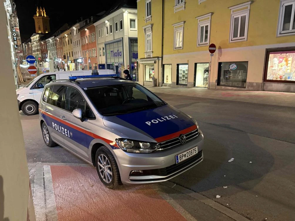 Police are seen after a knife attack near the main square in the city center of Villach, southern Austria on Feb. 15, 2025. (AFP)