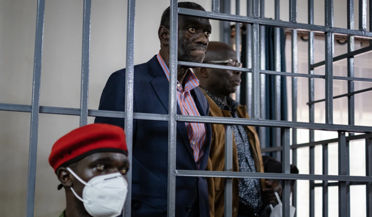 Uganda's veteran opposition figure Kizza Besigye stands in the dock at the Makindye Martial Court in Kampala, on November 20, 2024. (AFP)