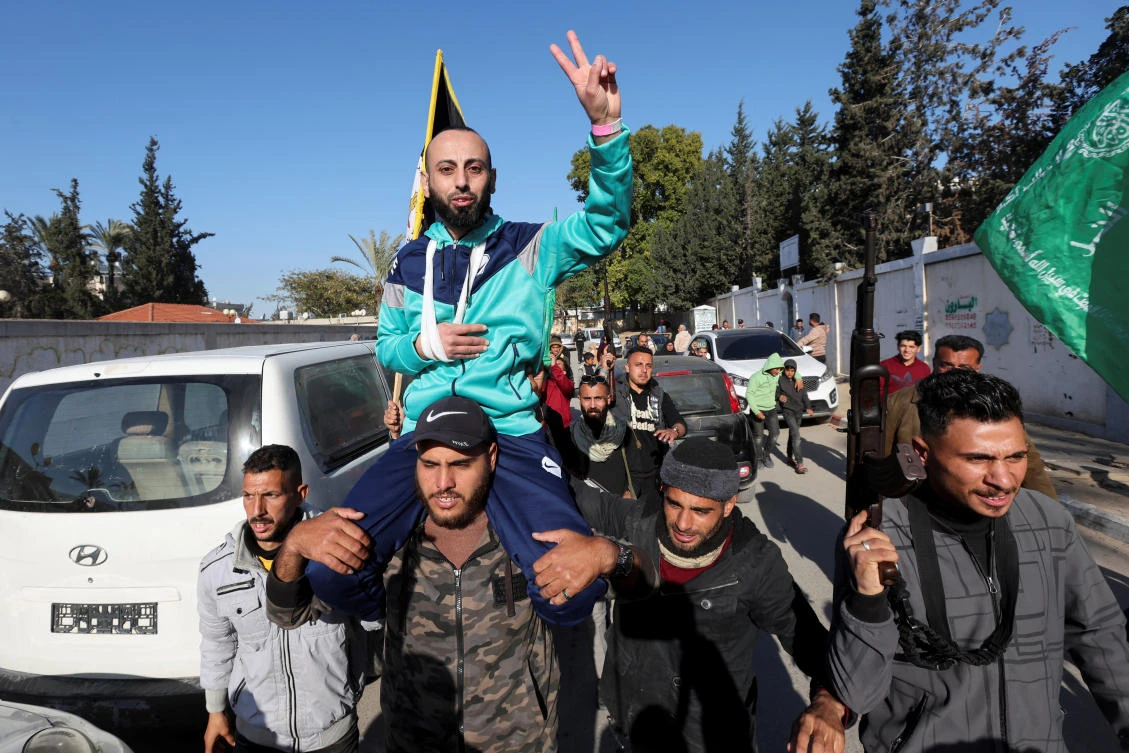 Tarek Rabie Safi, a freed Palestinian prisoner, is carried as he is greeted after being released by Israel as part of a hostages-prisoners swap and a ceasefire deal in Gaza in Khan Younis, in the southern Gaza Strip, February 15, 2025. (Reuters)