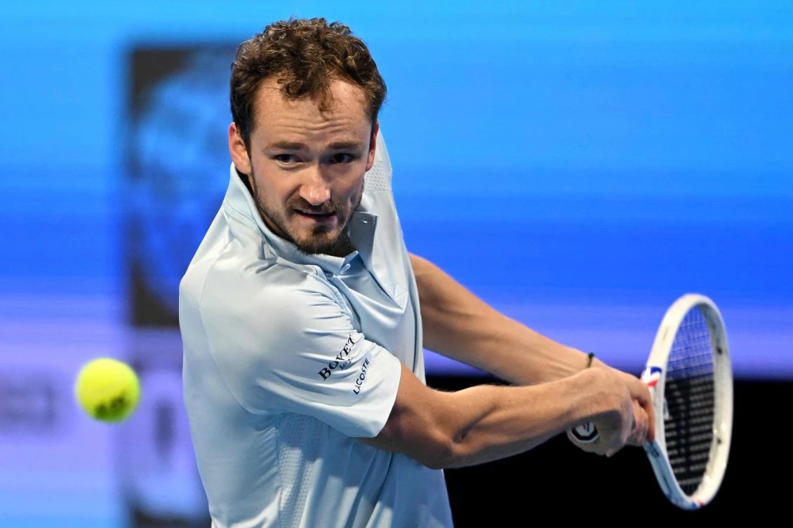 Russia’s Daniil Medvedev hits a return to Russia’s Karen Khachanov during their men’s singles match at the ATP Qatar Open tennis tournament in Doha on Feb. 18, 2025. (AFP)