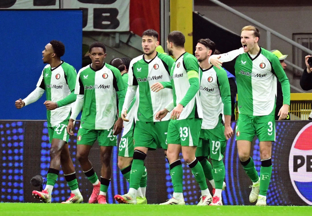 Feyenoord’s Julian Carranza celebrates scoring their first goal with teammates during their Champions League — Knockout Phase Playoff — Second Leg — against AC Milan at San Siro, Feb.18, 2025. (Reuters)