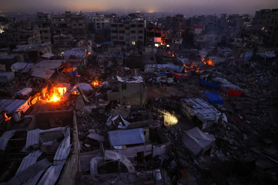 Palestinians camp amid the ruins of their houses in Jabalia in the northern Gaza Strip on Feb. 17, 2025. (AFP)