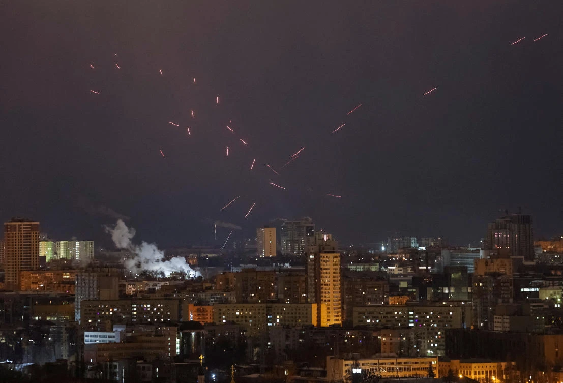 Tracers are seen in the night sky as Ukrainian servicemen fire at the drone during a Russian drone strike, amid Russia’s attack on Ukraine, in Kyiv, Ukraine February 21, 2025. (REUTERS)