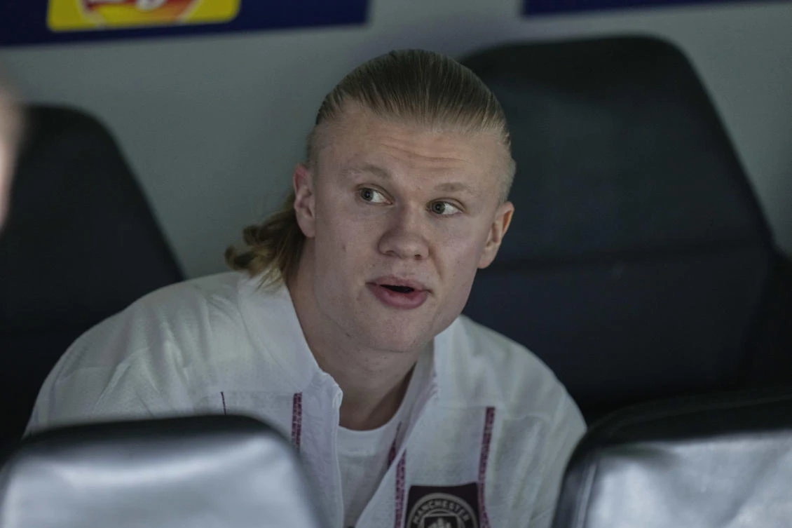 Manchester City’s Erling Haaland sits on the bench ahead of their Champions League playoff second leg match against Real Madrid at the Santiago Bernabeu Stadium in Madrid, Feb. 19, 2025. (AP)