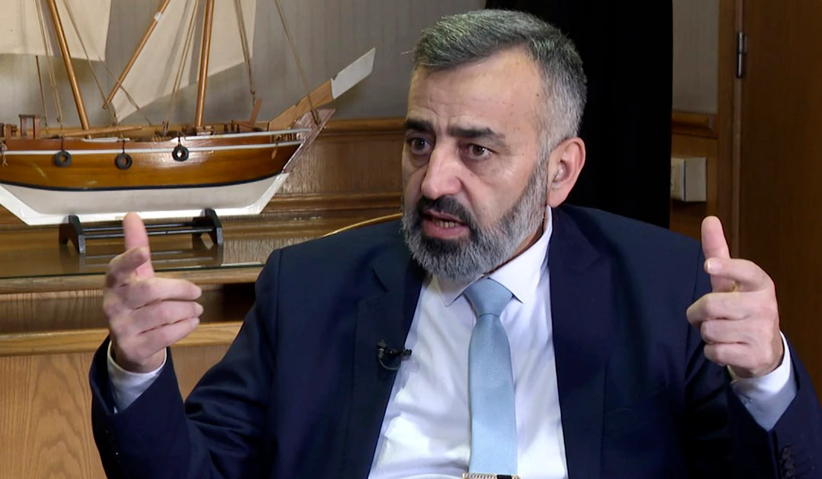 Hassan al-Daghim, spokesperson for the preparatory committee for Syria's national dialogue conference, speaks during an interview with The Associated Press in Damascus, Syria, Friday, Feb. 21, 2025. (AP)
