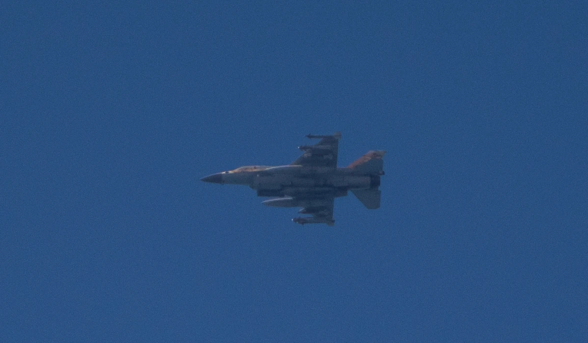 An Israeli fighter jet is seen from Hadera over the Mediterranean sea as it flies towards northern Israel, on Monday, Sept. 23, 2024. (AP)