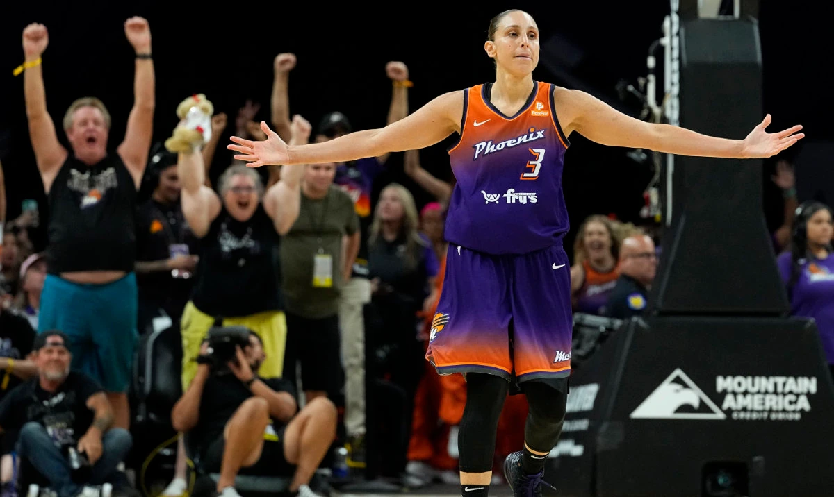 Phoenix Mercury’s Diana Taurasi celebrates after making her 10,000th career point during the second half of a WNBA basketball game against the Atlanta Dream on Aug. 3, 2023, in Phoenix. (AP)