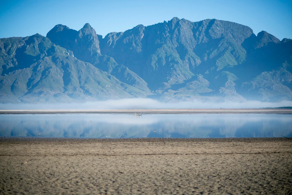 Above, the drought-hit Theewaterskloof Dam near Villiersdorp, about 108km from Cape Town in 2017. (AFP)