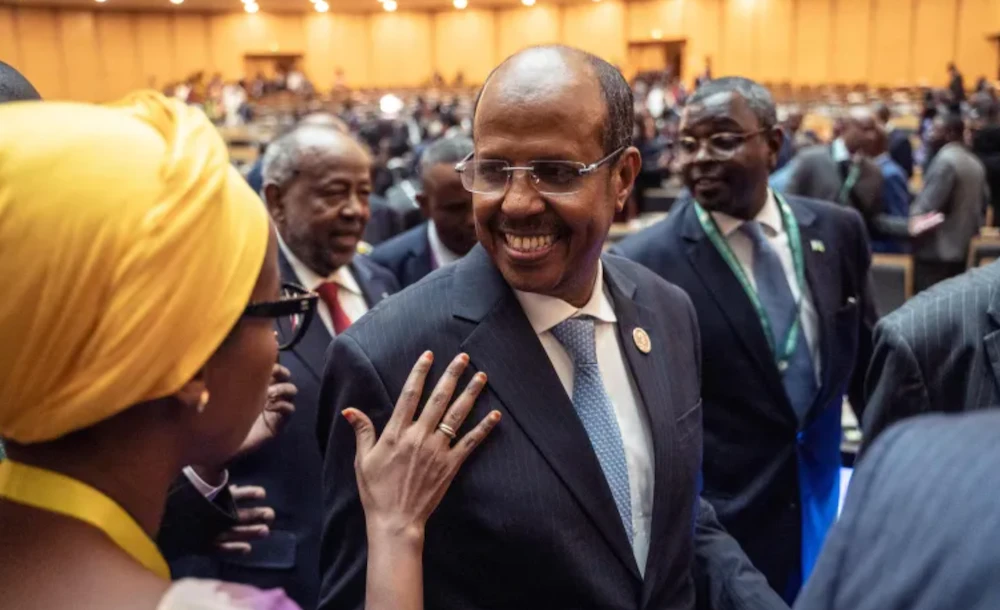 Newly elected chairperson for the Africa Union Commission Mahmoud Ali Youssouf (C). (AFP)
