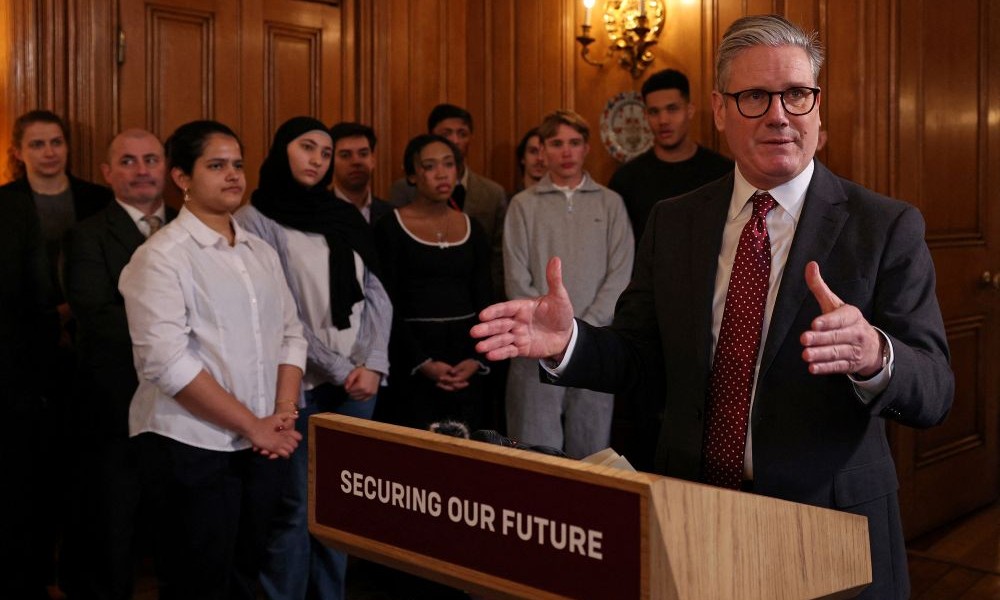 Keir Starmer speaks to apprentices and reps from SMEs in the defense industry, London, Britain, Mar. 3, 2025. (Reuters)