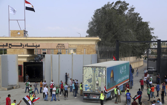A truck carrying humanitarian aid for the Gaza Strip crosses the Rafah border gate in Rafah (AP/File Photo)