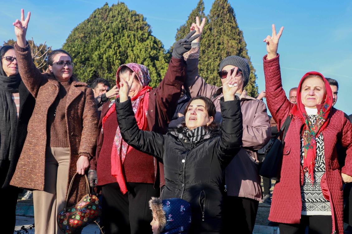 Iraqi Kurds flash the V for victory as people gather at Freedom Park to listen to an audio message by the founder of the Kurdistan Worker’s Party (PKK) Abdullah Ocalan in Sulaimaniyah, in Iraq’s autonomous Kurdistan reigion on February 27, 2025.(AFP)