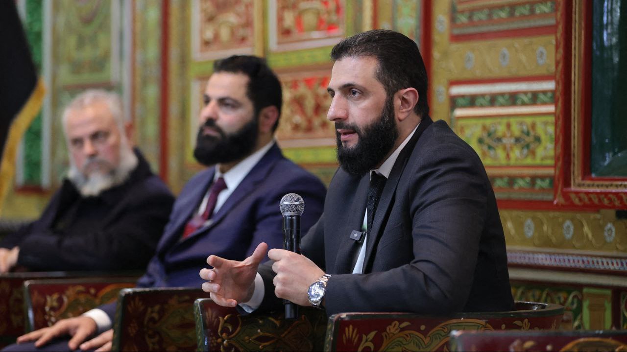 Syria's interim leader Ahmed al-Sharaa attending a meeting with officials and local leaders in the western coastal city of Tartus, Feb. 16, 2025. (AFP)