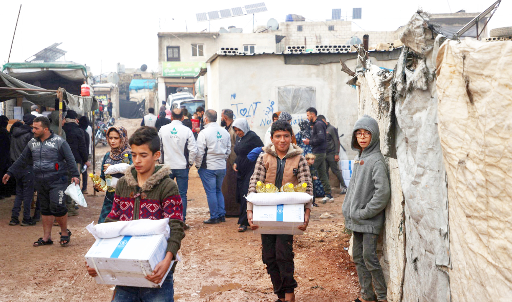 Syria’s national dialogue marked an important moment in the nation’s political transition, but US-led sanctions are hampering economic recovery and hurting war- weary Syrians, main. (AFP)