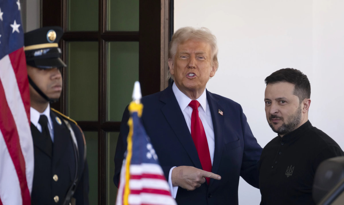 Ukraine President Volodymyr Zelenskyy, right, is greeted by President Donald Trump, center, as he arrives at the White House in Washington, Friday, Feb. 28, 2025. (AP)
