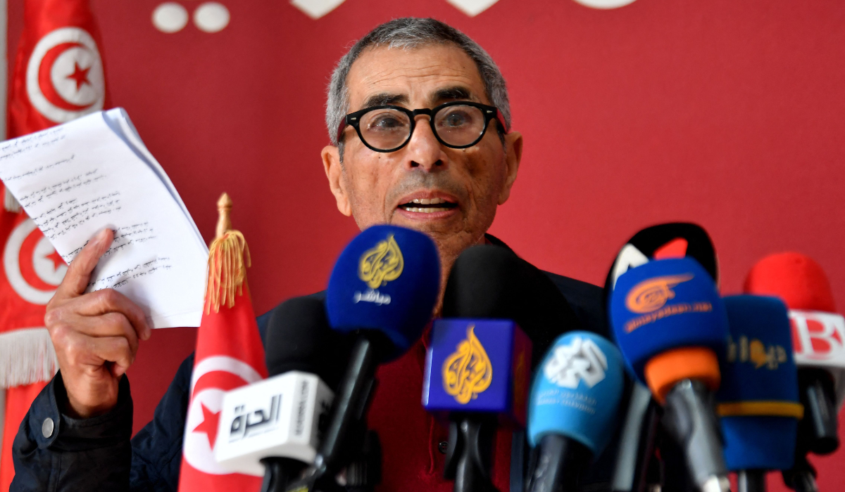 Left-wing Tunisian activist Ezzeddine Hazgui, a member of the defence committee for detainees accused of involvement in a conspiracy case against state security, addresses a press conference in Tunis, on February 27, 2025. (AFP)