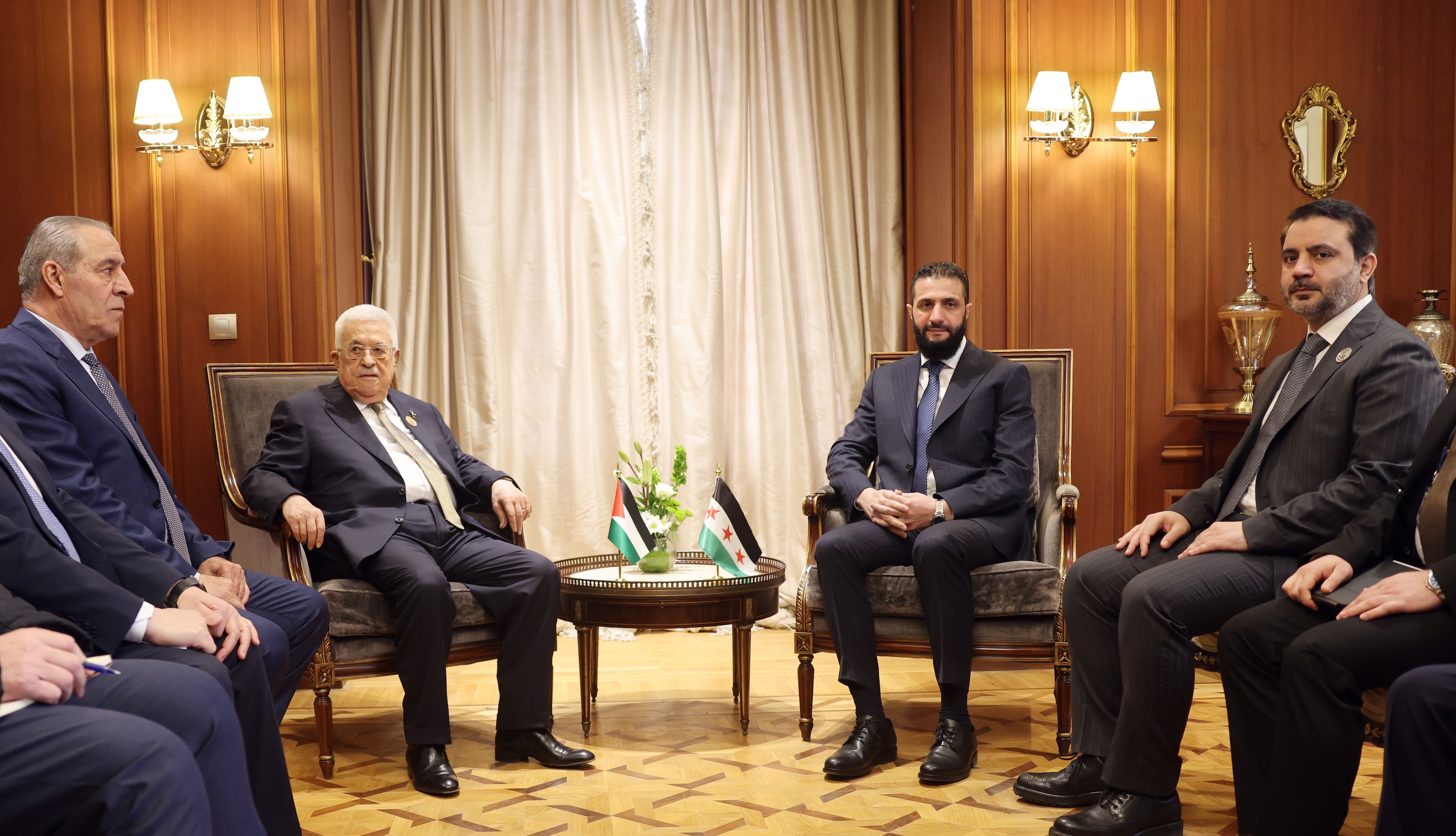 Palestinian President Mahmoud Abbas and Syria's interim president, Ahmed Al-Sharaa, in Cairo. (WAFA)