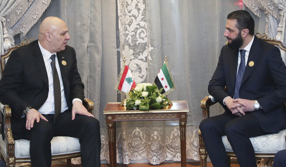 In this photo released by the Lebanese Presidency press office, Lebanese president Joseph Aoun, left, meets with Syria's interim President Ahmad al-Sharaa during the emergency Arab summit at Egypt's New Administrative Capital, just outside Cairo, Tuesday, March 4, 2025. (AP)