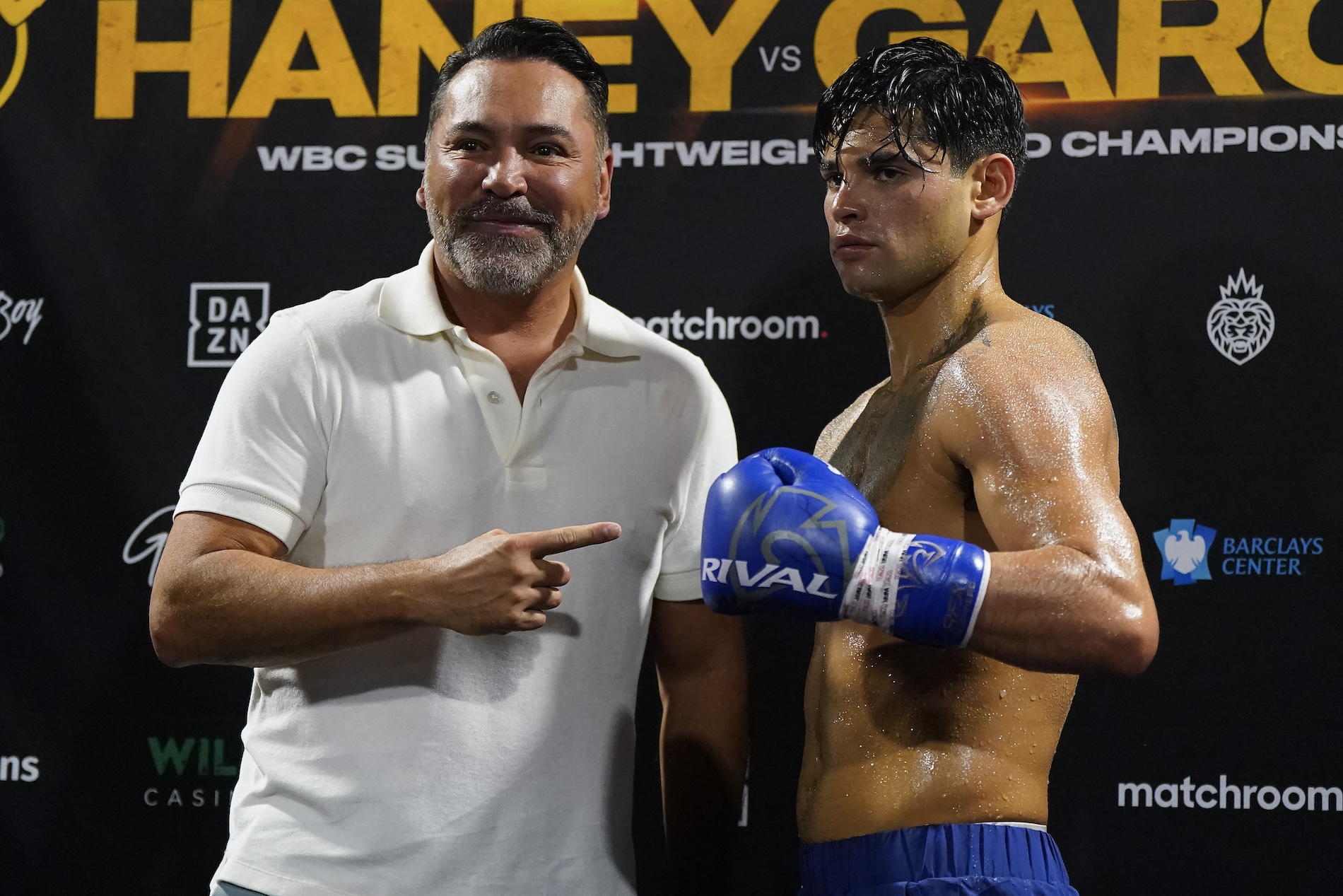 Hall of Fame boxer Oscar De La Hoya's Golden Boy Promotions has three fighters on the May 2 tripleheader including Ryan Garcia, right. (File/AFP)
