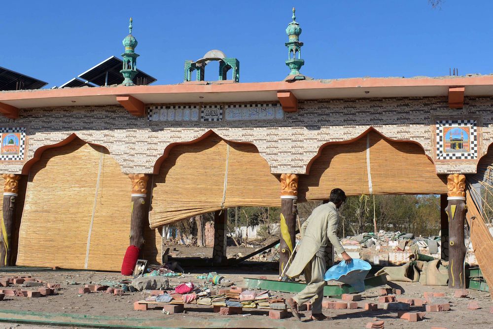 A group affiliated with the Pakistani Taliban, Jaish Al-Fursan, has claimed responsibility for the twin suicide bombing. (AFP)