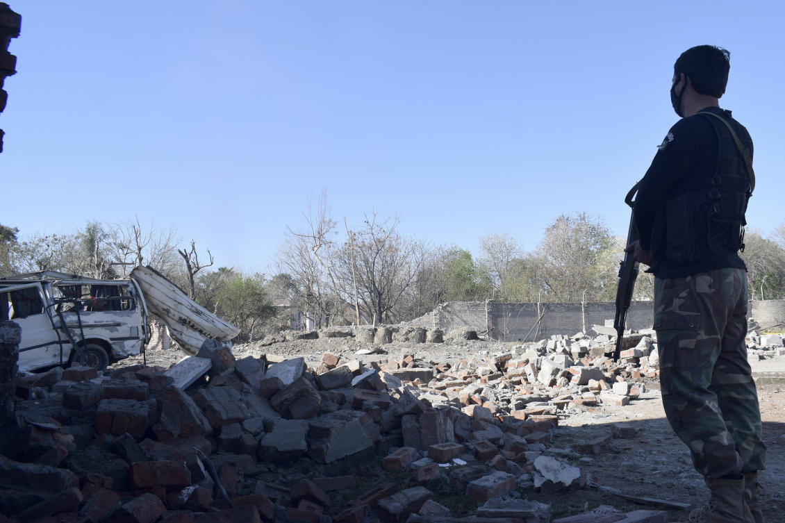 A police officer examines the damage at the site of Tuesday's suicide bombing, in Bannu, in northwestern Pakistan, Wednesday, March 5, 2025. (AP)