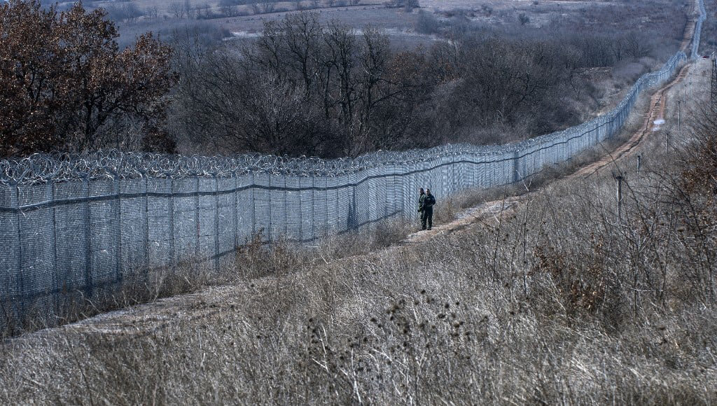 Bulgarian border police patrol next to a barbed wire wall fence erected on the Bulgaria-Turkiye border near the town of Lesovo. (AFP/File)