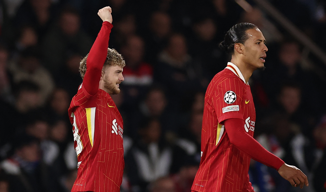 Liverpool's English forward #19 Harvey Elliott (L) celebrates after scoring Liverpool's first goal during the UEFA Champions League Round of 16 first leg football match between Paris Saint-Germain (FRA) and Liverpool (ENG) at the Parc des Princes stadium in Paris on March 5, 2025. (AFP)