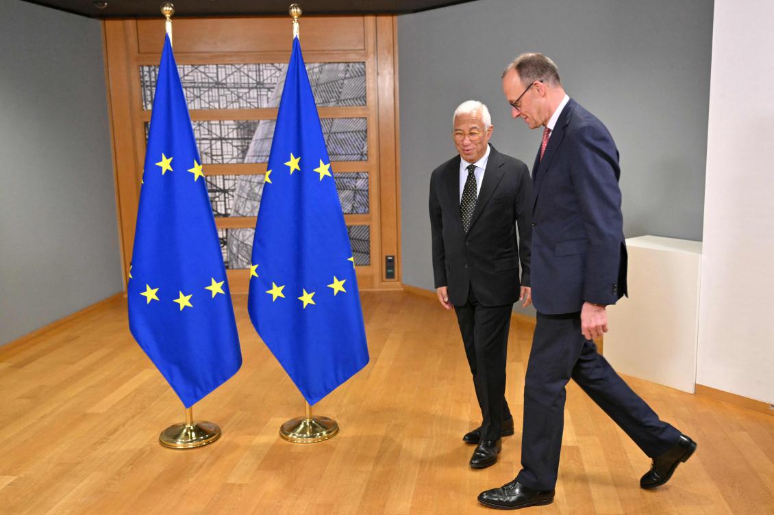 European Council President Antonio Costa, left, greets the leader of Germany’s Christian Democratic Union Friedrich Merz at the EU headquarters in Brussels on March 6, 2025. (AFP)