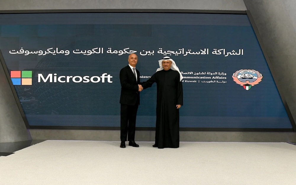 Omar Al-Omar, minister of state for communications affairs, and Samer Abu-Ltaif, president of Microsoft for Europe, the Middle East and Africa. (KUNA)