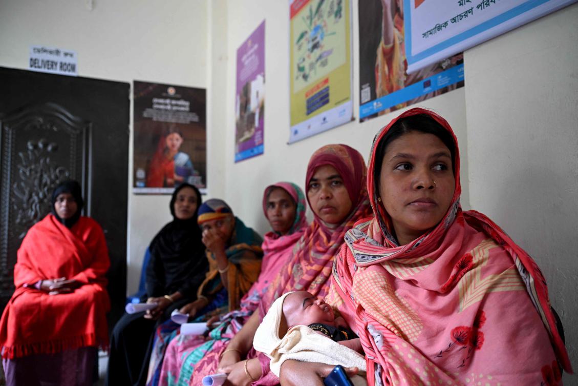 Young Bangladeshi mother Mafia Akhter’s decision to give birth at home and without a doctor left her grieving over her firstborn’s lifeless body and vowing never to repeat the ordeal. (AFP)