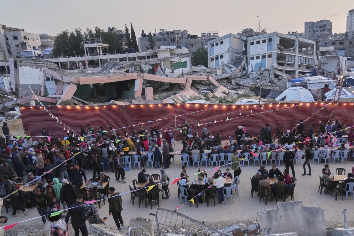 The cutbacks threaten to halt the small gains aid workers have made combatting Gaza’s humanitarian crisis during the Israel-Hamas ceasefire. (AP)