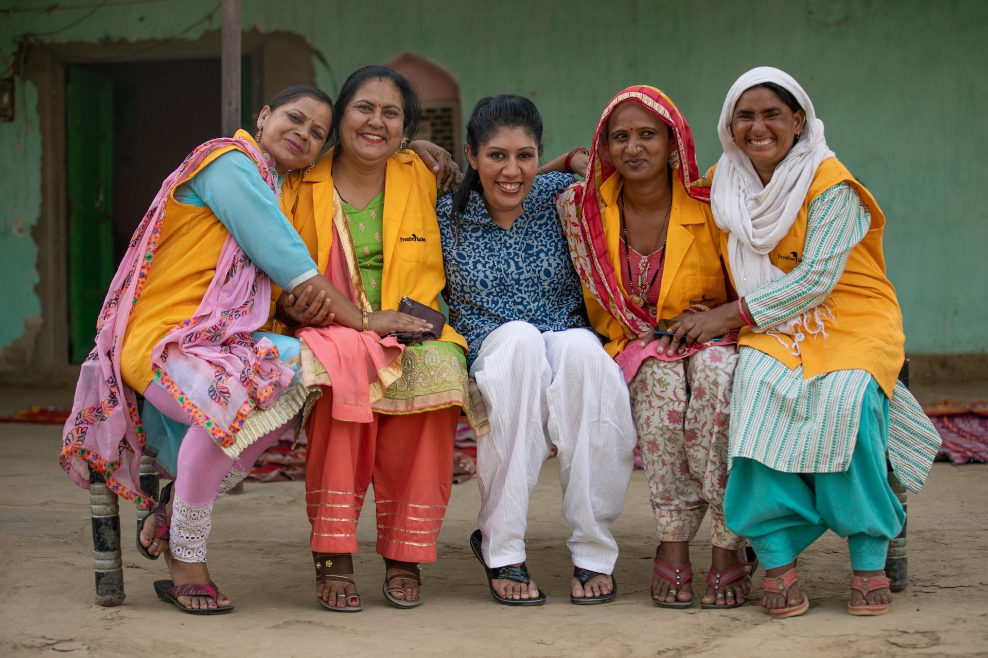 Ajaita Shah, center, poses with women involved in her projects in rural India. Her story was featured on the Indian PM’s X account on Women’s Day, March 8, 2025. (India PM Office)