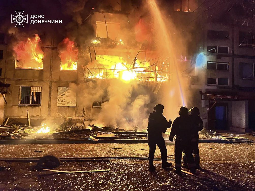 In this photo provided by the Ukrainian Emergency Service, firefighters put out the fire following a Russian rocket attack in Dobropillya, Donetsk region, Ukraine, Mar. 8, 2025. (AP)