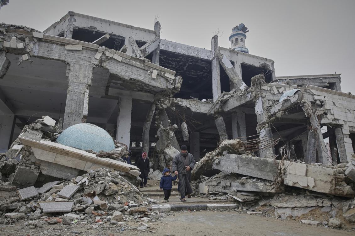 Palestinians leave after attending the first Friday prayers of Ramadan at the Imam Shafi'i Mosque, damaged by Israeli army strikes, in the Zeitoun neighborhood in Gaza City, March 7. (AP)