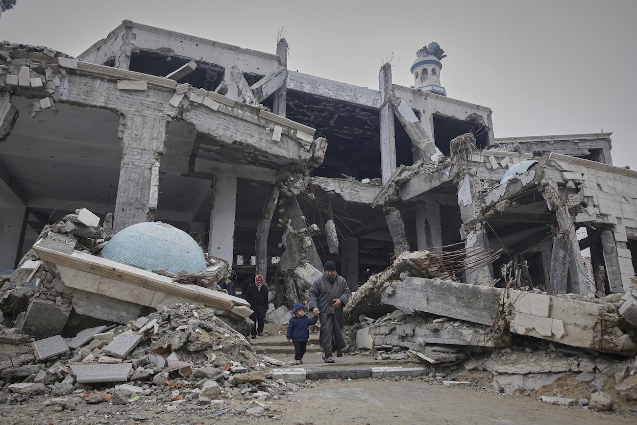 Palestinians leave after attending the first Friday prayers of Ramadan at Imam Shafi’i Mosque, damaged by Israeli army strikes, in Gaza City, Friday March 7, 2025.(AP)