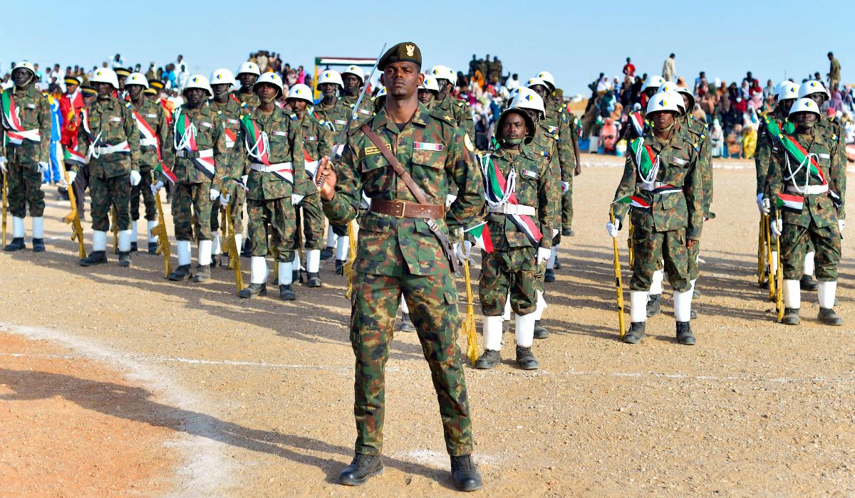 Newly graduated Sudanese army soldiers stand in attention during a ceremony in Merowe in northern Sudan on February 27, 2025. (AFP)
