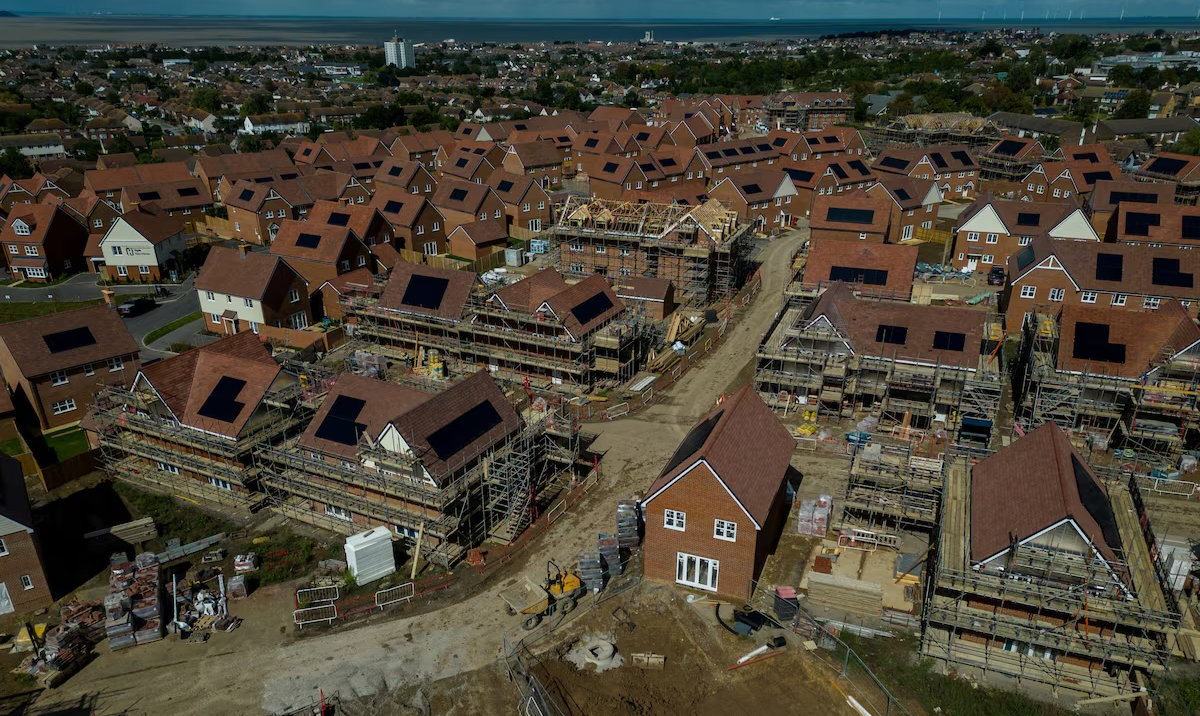 A drone view shows construction work taking place on new homes at Whitstable Heights a new housing development, as the UK government aims to build 1.5 million new homes, in Whitstable, Britain, September 11, 2024. (Reuters)