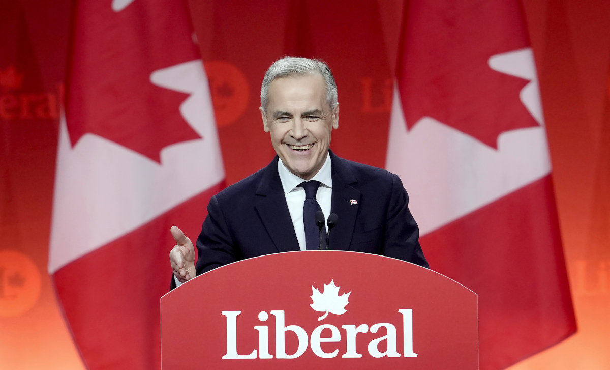 Liberal Leader Mark Carney smiles as he delivers his victory speech during the Liberal leadership announcement in Ottawa, Ontario, on March 9, 2025. (Adrian Wyld/The Canadian Press via AP)